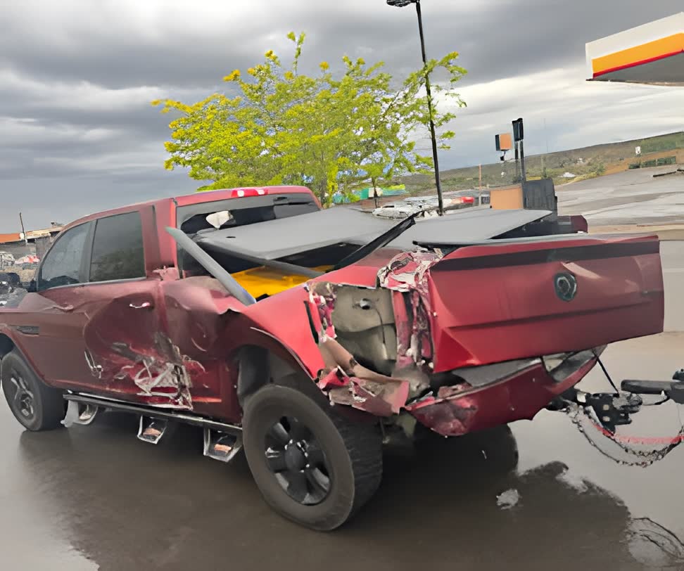 Wrecked pickup truck ready for removal